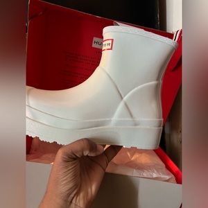 Brand new Hunter boots never worn. Shimmer Silver color kind of platform